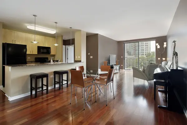 Condo with open floor plan and granite kitchen counter top